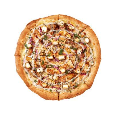 The ChatGPT-inspired chicken pizza with paneer, tahini and zaatar. Photo: Dodo Pizza