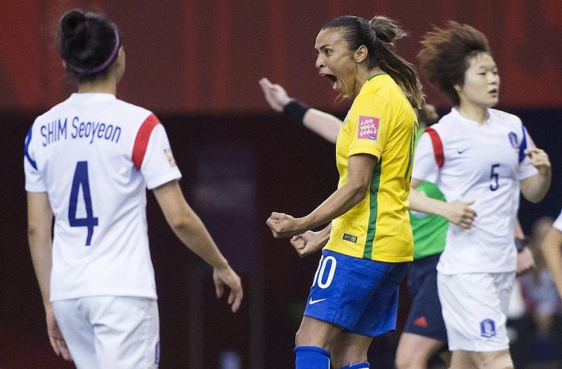 Brazil's Marta celebrates her goal against South Korea on Tuesday at the Women's World Cup in Montreal. Graham Hughes / The Canadian Press / AP / June 9, 2015