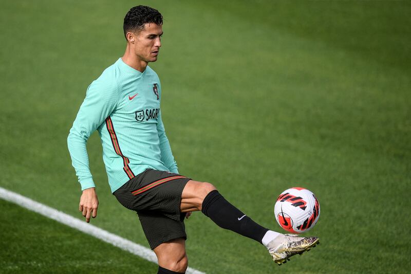 Portugal's Cristiano Ronaldo controls the ball at training. AFP
