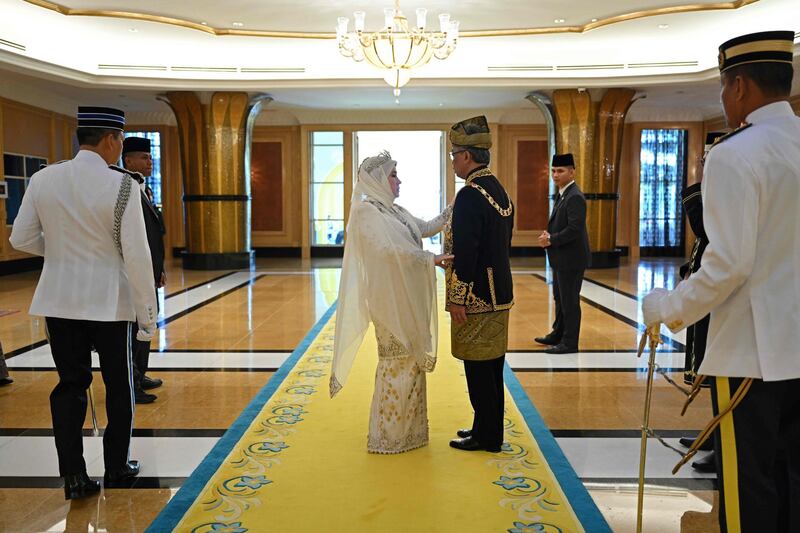 Malaysia's new king and queen. Malaysia Information Ministry via AP