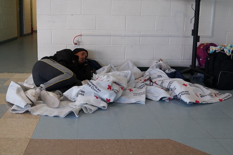 Ender Gonzales, a migrant from Venezuela, rests in a shelter in El Paso, Texas. Willy Lowry / The National