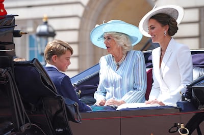The Duchess of Cornwall and the Duchess of Cambridge, with Prince George, during Trooping the Colour on Thursday. PA