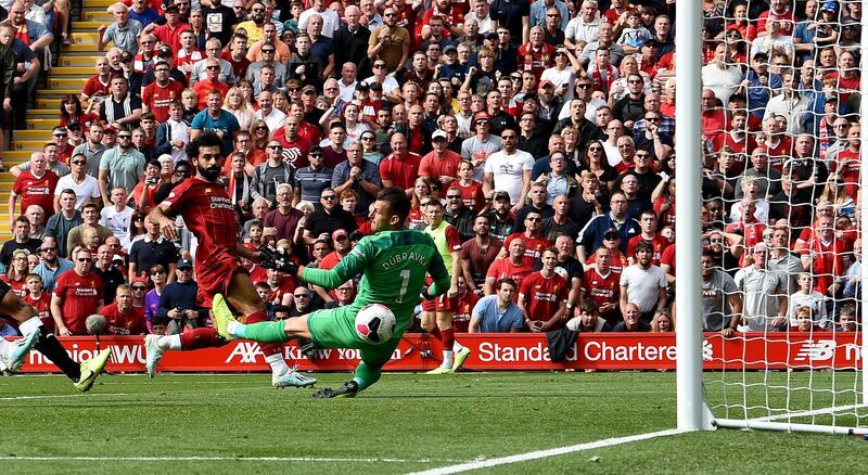 LIVERPOOL, ENGLAND - SEPTEMBER 14: (THE SUN OUT, THE SUN ON SUNDAY OUT)  Mohamed Salah  of Liverpool  scores the third goal during the Premier League match between Liverpool FC and Newcastle United at Anfield on September 14, 2019 in Liverpool, United Kingdom. (Photo by John Powell/Liverpool FC via Getty Images)