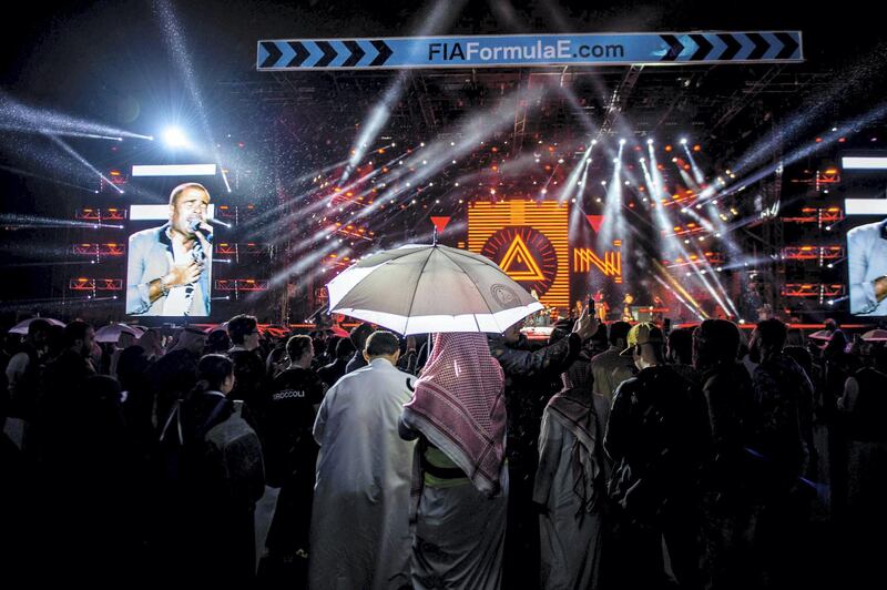 The rain didn't dampen the spirits of concert-goers who wanted to see Diab perform.  Courtesy Sportscode Images