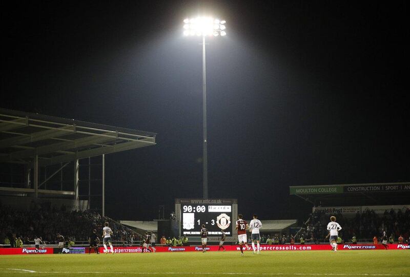 General view of the action in the League Cup third round match between Manchester United and Northampton Town. Darren Staples / Reuters