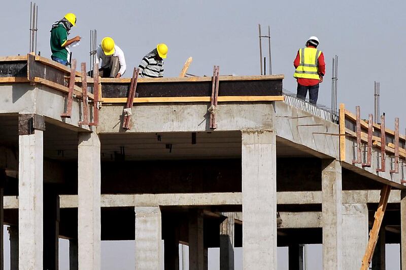 Foreign labourers work at a construction site in the Saudi capital Riyadh. Fayez Nureldine / AFP