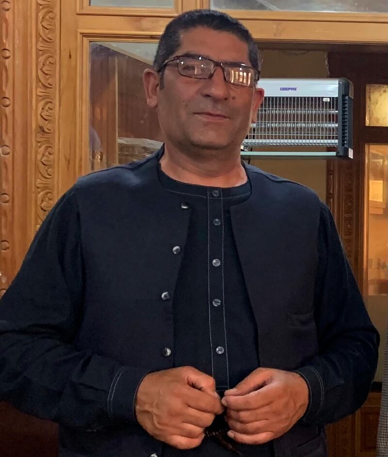 Afghan Journalist Rahmatullah Nikzad poses for photograph in Kabul, Afghanistan, July 29, 2019. Nikzad , a prominent local journalist was shot dead by unknown assailants in Afghanistan's central Ghazni province on Monday, Dec. 21, 2020. He was the fourth journalist to be killed in the war-ravaged nation in just two months. Afghanistan is considered one of the world's most dangerous countries for journalists. (AP Photo/Rahmat Gul)