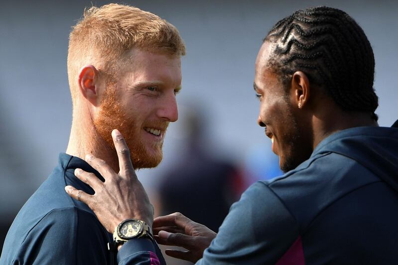 England's Ben Stokes, left, and Jofra Archer share a joke during a nets session. AFP