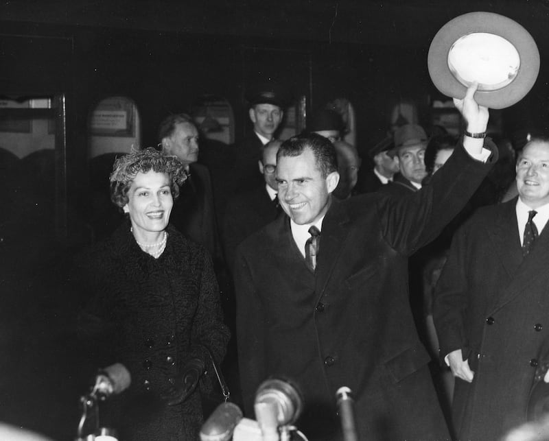 American Vice President Richard Nixon greets the crowds on arrival at Gatwick Airport in 1958