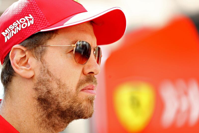 Sebastian Vettel of Germany and Ferrari in the Paddock before final practice on Saturday. Getty