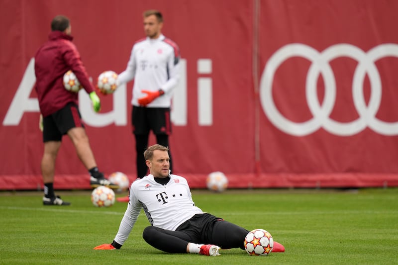 Bayern goalkeeper Manuel Neuer stretches. AP