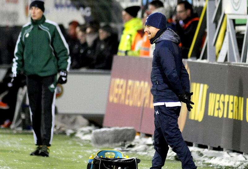 Tottenham Hotspur coach Andre Villas-Boas, right, is starting to show signs of strain as pressure builds amid his team's underwhelming performances. Rune Stoltz Bertinussen / Reuters