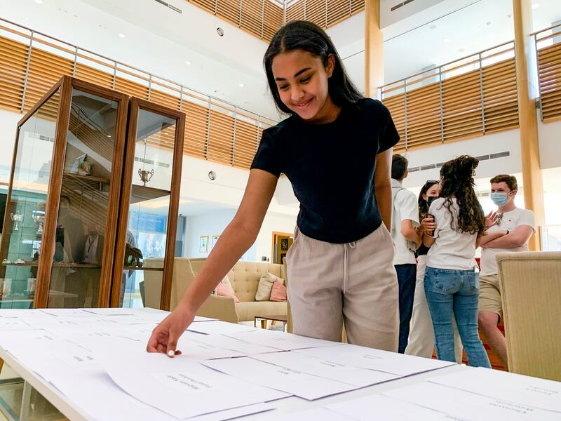 A student receiving her GCSE results at Brighton College, Dubai. 