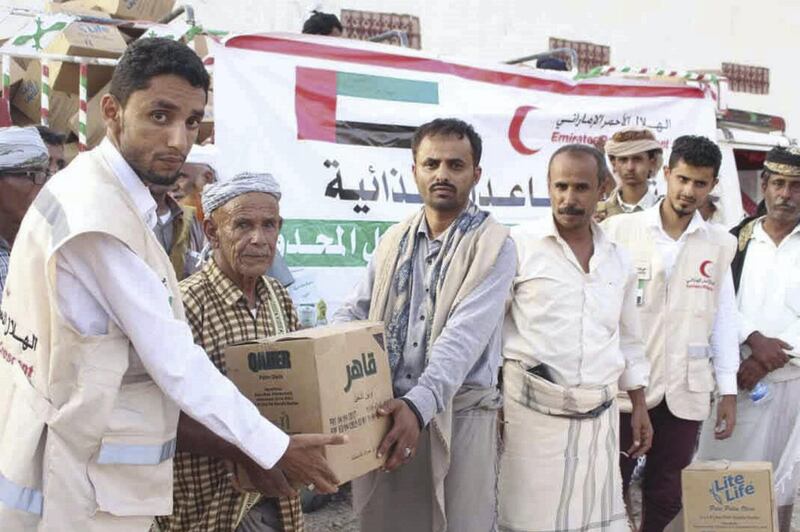 Emirates Red Crescent distributes emergency food aid in the Shabwa Governorate of Yemen on Monday. Wam