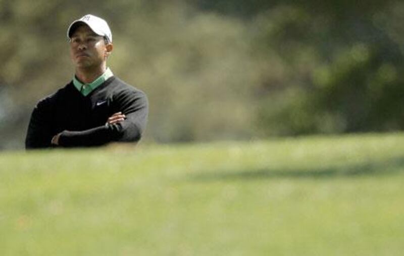 Tiger Woods waits to hit his tee shot on the fourth hole during second round play in the 2010 Masters golf tournament at the Augusta National Golf Club in Augusta, Georgia, on Friday, April 9, 2010.