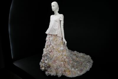 A couture gown by Karl Lagerfeld on display as part of the exhibition. AP