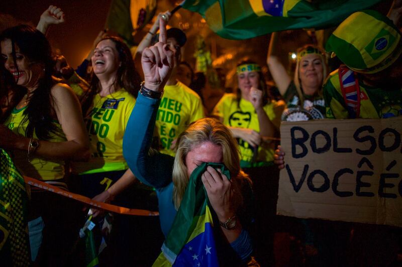 Brazil's far-right president-elect Jair Bolsonaro pledged to defend "the constitution, democracy and freedom" after winning a polarizing run-off election Sunday. AFP