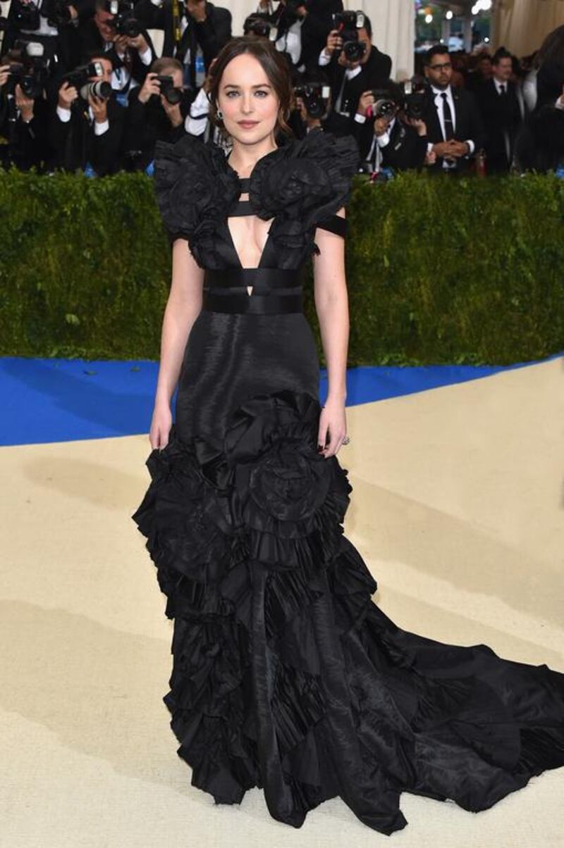 Dakota Johnson wears a custom-made Gucci gown. Courtesy of Gucci