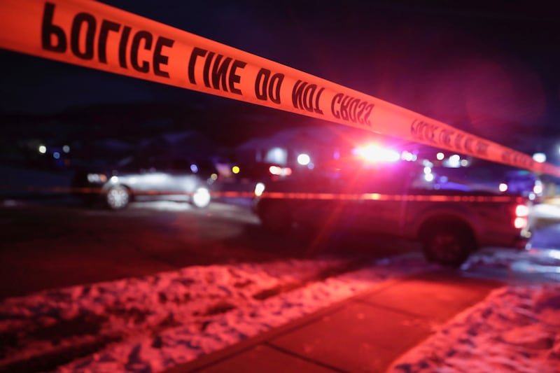 Police tape surrounds the crime scene in Enoch, Utah, where eight members of a family were found from gunshot wounds, Wednesday, Jan.  4, 2023.  (Ben B.  Braun / The Deseret News via AP)