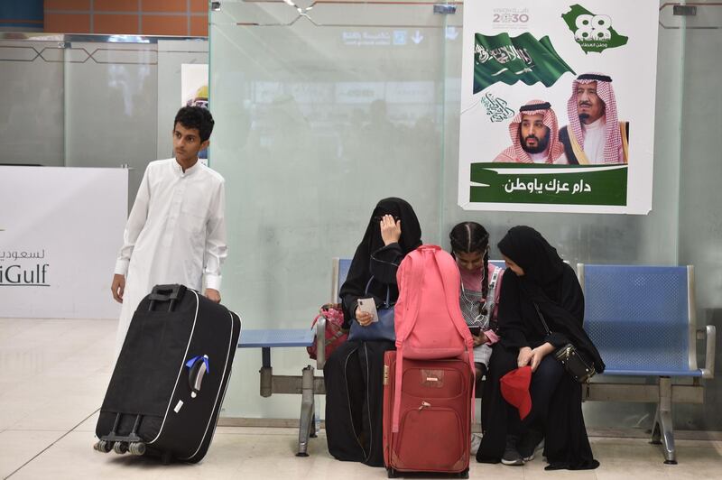 Passengers waiting for their flight at Abha airport in Saudi Arabia. AFP
