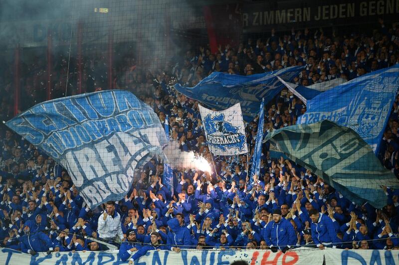 BERLIN, GERMANY - NOVEMBER 02: Fans let off a flare and wave flags prior to the Bundesliga match between 1. FC Union Berlin and Hertha BSC at Stadion An der Alten Foersterei on November 02, 2019 in Berlin, Germany. (Photo by Thomas F. Starke/2019 Getty Images)