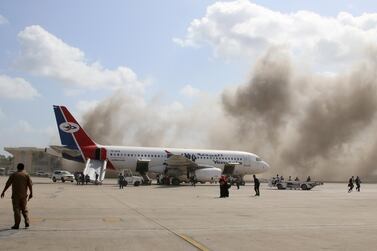 Dust rises from an attack on Aden airport as Yemen's newly-formed unity government arrives on December 30, 2020. Reuters