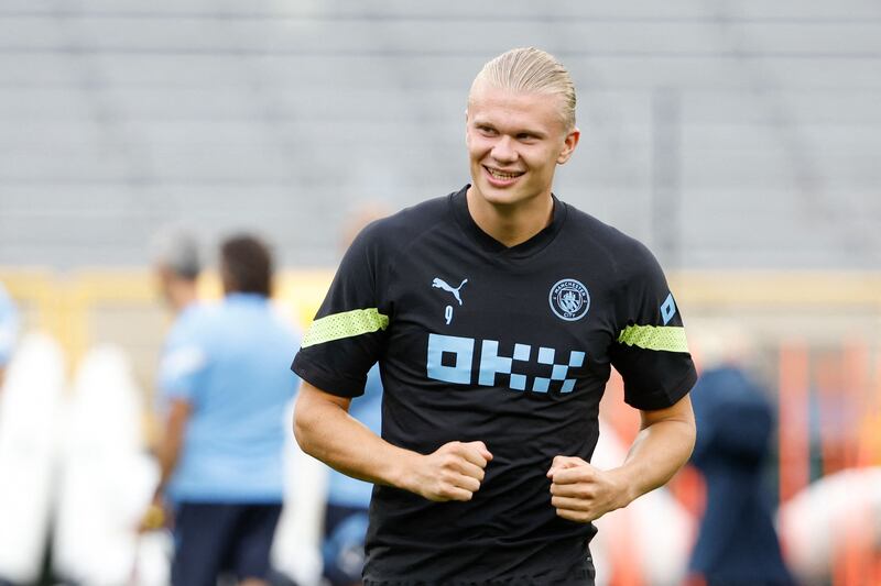 Manchester City forward Erling Haaland warms up during a training session ahead of friendly against Bayern Munich at Lambeau Field in Green Bay, Wisconsin. AFP