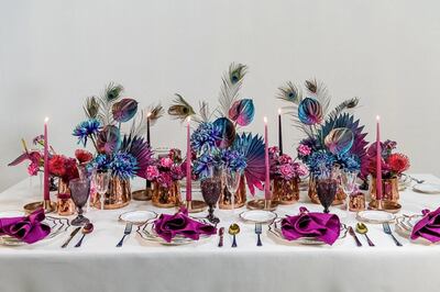 Peacock-themed tablescape by Pick A Party