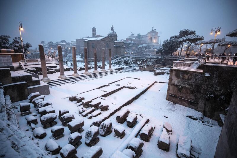 The Fori Imperiali is covered by snow during a snowfall in Rome, Italy. Angelo Carconi / EPA