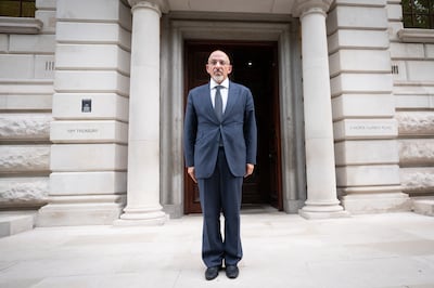 Chancellor Nadhim Zahawi poses for a photograph outside the HM Treasury in Westminster. PA