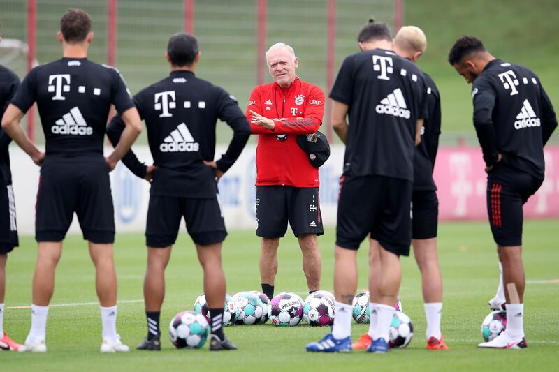 Assistant coach Hermann Gerland talks to players during their first training session. Getty Images