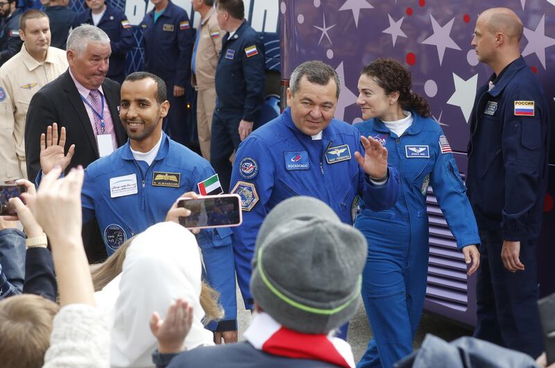 epa07867806 (L-R) Members of the International Space Station (ISS) expedition 61/62, UAE astronaut Hazza Al Mansouri, Roscosmos cosmonaut Oleg Skripochka and NASA astronaut Jessica Meir leave a hotel during the send-off ceremony before the launch of the Soyuz MS-15 spacecraft at the Baikonur cosmodrome in Kazakhstan, 25 September 2019. The launch of the mission of members of the International Space Station (ISS) expedition 61/62 is scheduled on 25 September from the Baikonur Cosmodrome. Mansouri will be the first Emirati in space.  EPA/MAXIM SHIPENKOV
