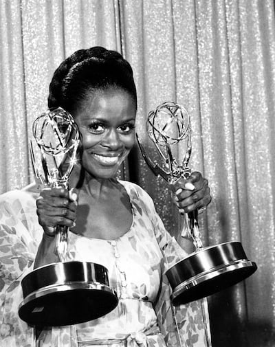 FILE - Cicely Tyson poses with her Emmy statuettes at the annual Emmy Awards presentation in Los Angeles, Ca., May 28, 1974. Tyson won for her role in "The Autobiography of Miss Jane Pittman" for actress of the year, special, and best lead actress in a television drama for a special program. Tyson, the pioneering Black actress who gained an Oscar nomination for her role as the sharecropper's wife in "Sounder," a Tony Award in 2013 at age 88 and touched TV viewers' hearts in "The Autobiography of Miss Jane Pittman," has died. She was 96. Tyson's death was announced by her family, via her manager Larry Thompson, who did not immediately provide additional details. (AP Photo, File)
