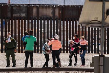 Border Patrol agents apprehend a group of migrants near El Paso, Texas. AFP