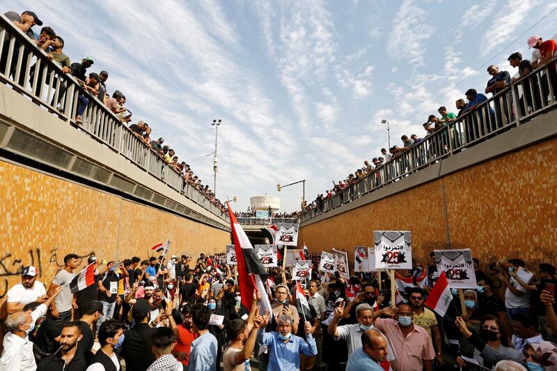 Iraqi demonstrators gather to mark the first anniversary of the anti-government protests in Baghdad. REUTERS