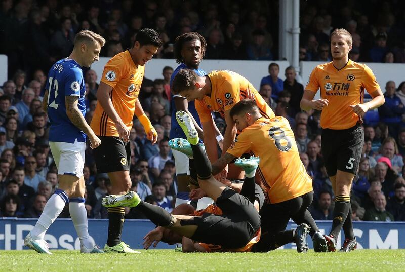 Wolverhampton Wanderers' Romain Saiss celebrates scoring their first goal with teammates. Reuters