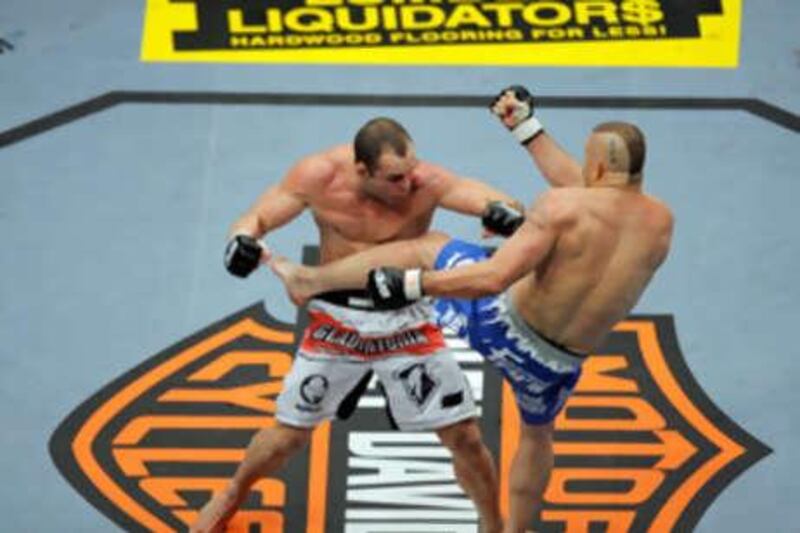Wanderlei Silva, of Brazil, left, is kicked by Chuck Liddell during their light heavyweight bout at UFC 79 at the Mandalay Bay hotel and casino in Las Vegas, Saturday, Dec. 29, 2007.
