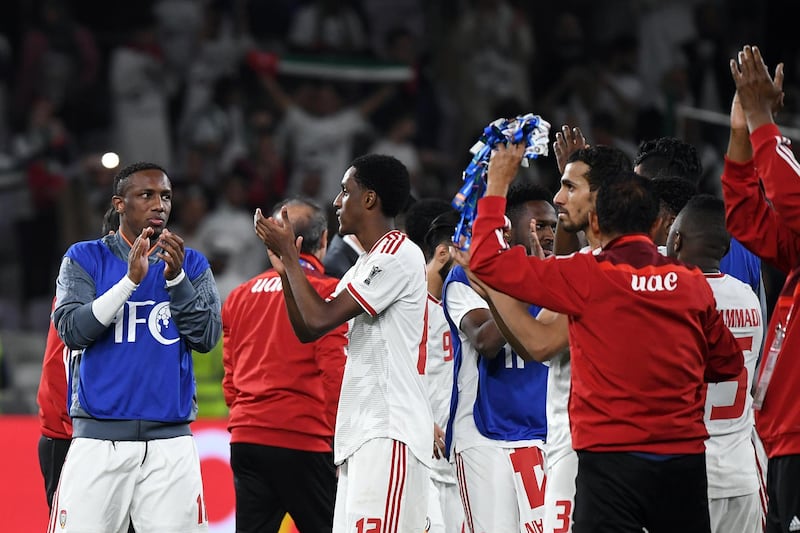 The UAE players celebrate as they begin to think ahead to Tuesday's semi-final with Qatar. EPA