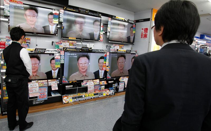 TV news report the death of North Korean leader Kim Jong Il at a Labi Yamada Denki Co. retailer in Tokyo, Japan, Monday, Dec. 19, 2011. Kim Jong Il, North Korea's mercurial and enigmatic longtime leader, has died of heart failure. He was 69.  (AP Photo/Shuji Kajiyama) *** Local Caption ***  Japan North Korea Obit Kim Jong Il .JPEG-0a85b.jpg