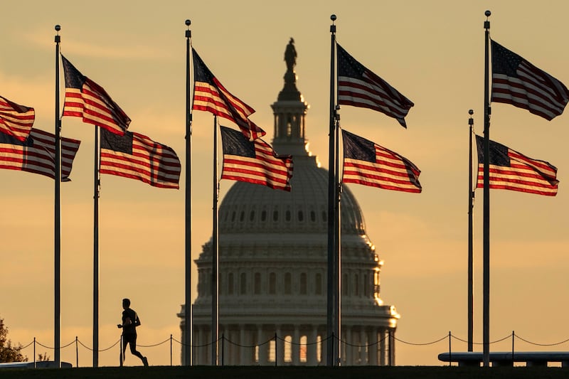US flags flutter in front of the Capitol Building in Washington as midterm elections are held. EPA