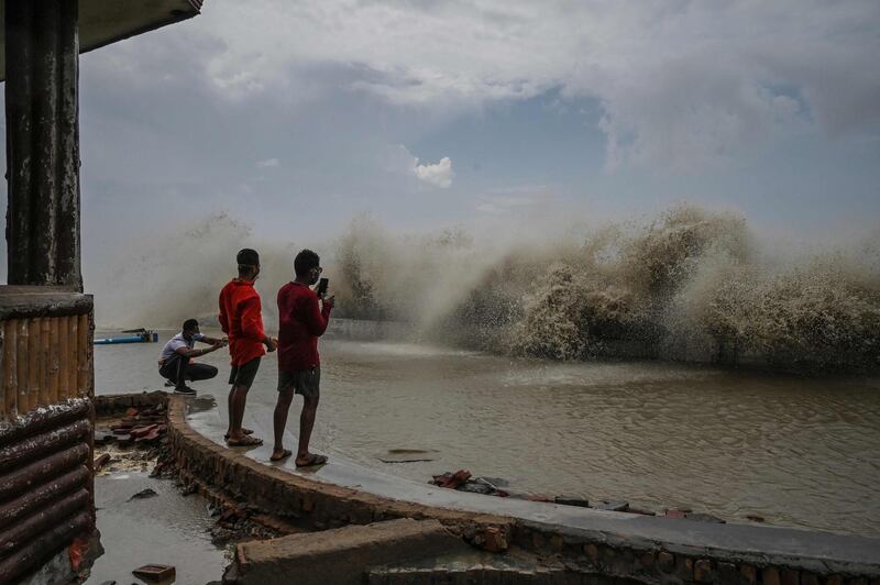 Waves caused by Cyclone Yaas lash the shore in Digha, about 190km from Kolkata. AFP