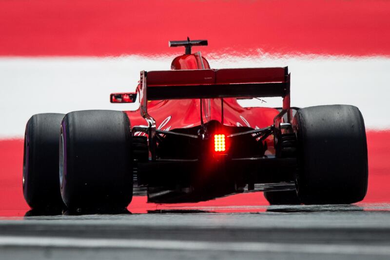 Ferrari's German driver Sebastian Vettel drives his car during the third practice session ahead of the Austrian Formula One Grand Prix in Spielberg, central Austria, on June 30, 2018. / AFP / VLADIMIR SIMICEK
