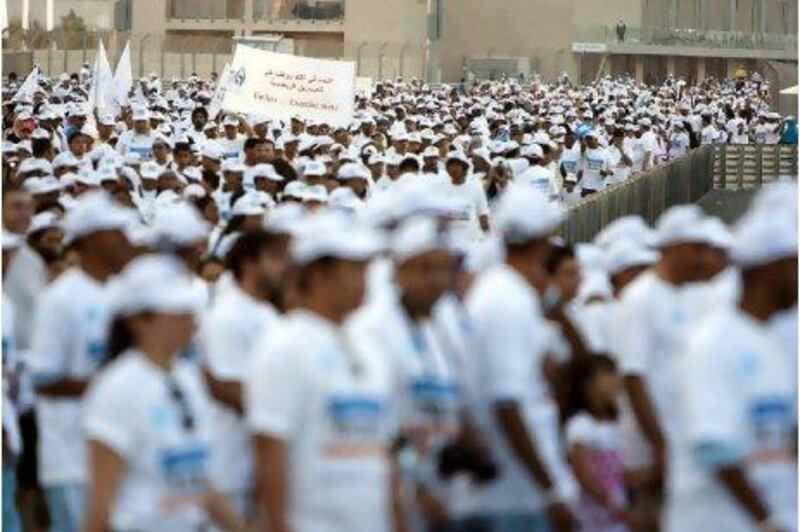 An estimated 15,000 people took part in the walk at Yas Marina Circuit yesterday.