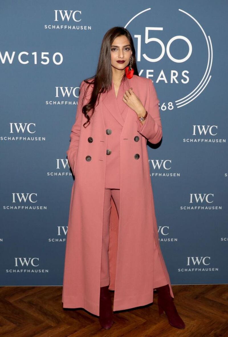 GENEVA, SWITZERLAND - JANUARY 16:  Sonam Kapoor visits the IWC booth during the Maison's launch of its Jubilee Collection at the Salon International de la Haute Horlogerie (SIHH) on January 16, 2018 in Geneva, Switzerland. #IWC150  (Photo by Chris Jackson/Getty Images for IWC)