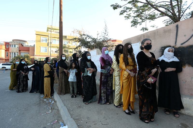 Voters queue at a polling station in Duhok. Photo: Reuters