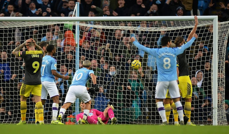 Manchester City's Sergio Aguero scores against Southampton. Reuters