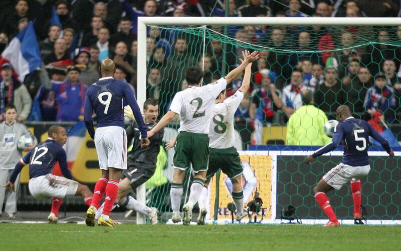 France's William Gallas, second right, scores the winning goal after being set up by Thierry Henry, left, during the Fifa World Cup qualifier at the Stade de France in Paris.