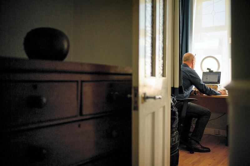 LONDON, ENGLAND - JUNE 01: Crisis Volunteer David Whiting sits in his office, where he usually responds to texters for the crisis text service Shout 85258 on June 01, 2020 at his home in the Sidcup area of London, United Kingdom. After serving for 31 years in the fire service, David volunteered with Shout in April to make use of his experience and knowledge, while not working in his regular job of face-to-face mental health support. Regularly dealing with issues such as suicide, self-harm, anxiety and depression, David found that the back-up offered to volunteers has been incredibly helpful, with supervisors overseeing conversations, a debrief ‚Äòchat room‚Äô area for peer-to-peer support and follow-up support if required. Shout is the UK's first 24/7 crisis text line for everyone, and is free, confidential and anonymous to text.¬†Powered by a team of Crisis Volunteers, Shout uses the anonymised data collated to give the service unique insights into mental health trends to help improve people‚Äôs lives. In the weeks before lockdown was announced on March 23rd, Shout was typically handling around 750 conversations a day. This has been steadily growing, often seeing more than 1,000 conversations a day. Prince William, the Duke of Cambridge, recently revealed that he has been one such volunteer anonymously counseling people during the Covid-19 lockdown, after having been trained by the charity. The Cambridges and the Duke and Duchess of Sussex helped launch the Shout 85258 service last year, investing ¬£3 million via their Royal Foundation. (Photo by Leon Neal/Getty Images)