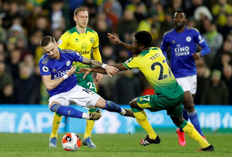 Leicester's James Maddison is fouled by Alexander Tettey of Norwich. Reuters