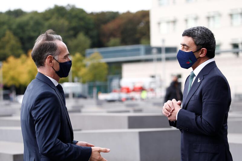 Sheikh Abdullah bin Zayed talks with with German Foreign Minister Heiko Maas as he and his Israeli counterpart Gabi Ashkenazi visit the Holocaust memorial together prior to their historic meeting in Berlin, Germany.  Reuters